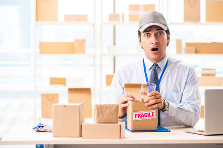 Male employee working in box delivery relocation serviceの写真素材