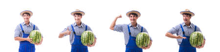 Young farmer with watermelon isolated on whiteの写真素材