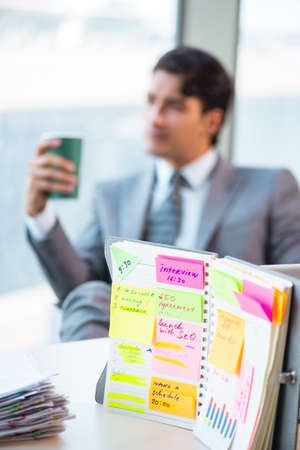Young successful businessman working at the officeの写真素材