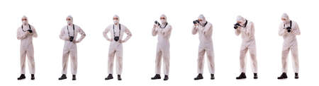 Forensic specialist in protective suit taking photos on whiteの写真素材