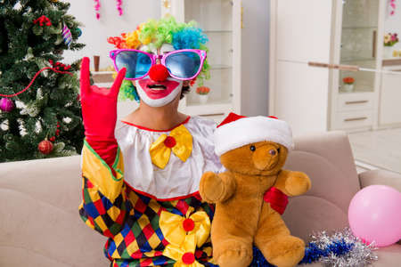 Funny clown in Christmas celebration concept