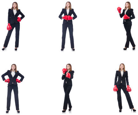 Businesswoman with boxing gloves isolated on whiteの写真素材