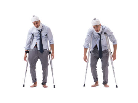 Injured businessman isolated on whiteの写真素材