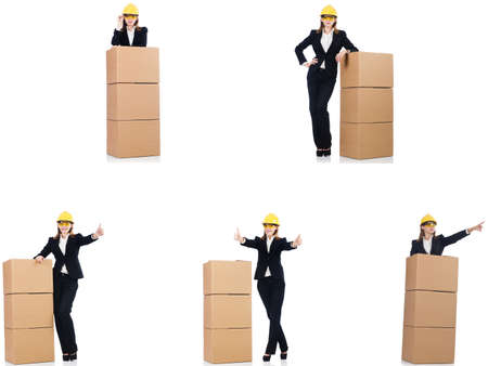 Woman builder with box isolated on whiteの写真素材