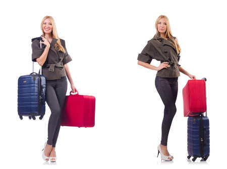 Beautiful woman with suitcase in vacation conceptの写真素材