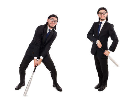 Young elegant man in black suit holding bat isolated on whiteの写真素材