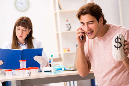 Male sperm donor visiting clinicの写真素材