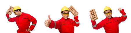 Construction worker with clay bricks on white