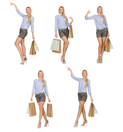 Woman with shopping bags isolated on whiteの写真素材