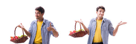 Man with basket of fruits and vegetablesの写真素材