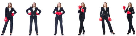 Businesswoman with boxing gloves isolated on whiteの写真素材
