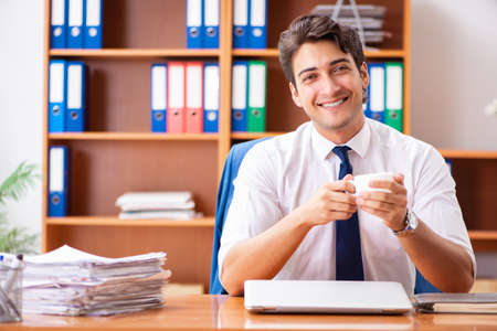 Young employee working in the officeの写真素材