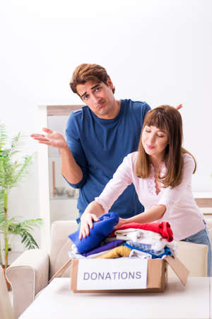 Concept of charity with donated clothingの写真素材