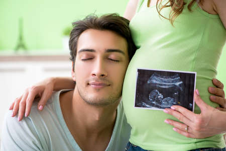 Young family finding out about pregnancy