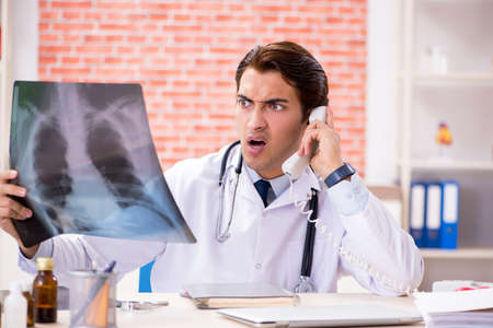 Young doctor working in hospital