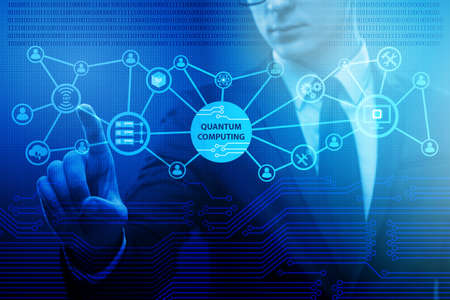 Businessman pressing virtual button in quantum computing concept