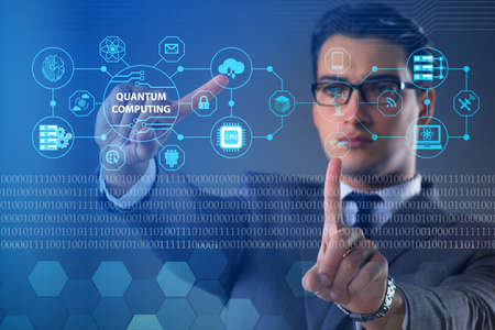 Businessman pressing virtual button in quantum computing concept
