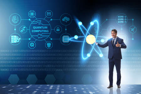 Businessman pressing virtual button in quantum computing conceptの写真素材