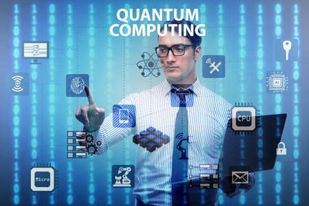 Businessman pressing virtual button in quantum computing conceptの写真素材
