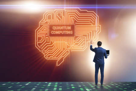 Businessman pressing virtual button in quantum computing conceptの写真素材