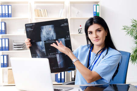 Female doctor radiologist working in the clinic
