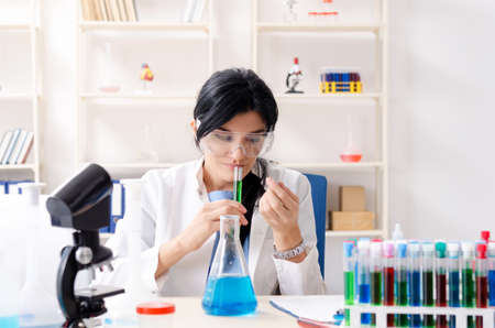Female chemist working at the labの写真素材