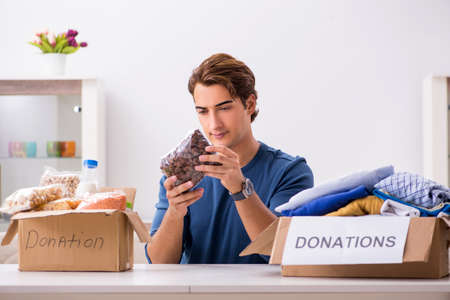 Concept of charity with donated clothingの写真素材