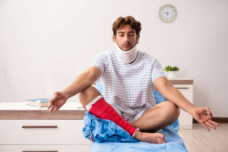 Injured man waiting treatment in the hospitalの写真素材