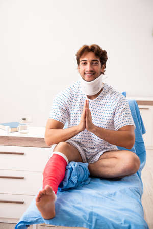 Injured man waiting treatment in the hospitalの写真素材