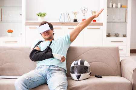 Injured motorbike rider recovering at homeの写真素材