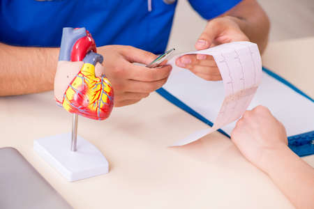 Young patient visiting doctor cardiologistの写真素材