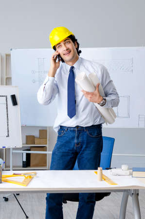 Young handsome architect working on the projectの写真素材