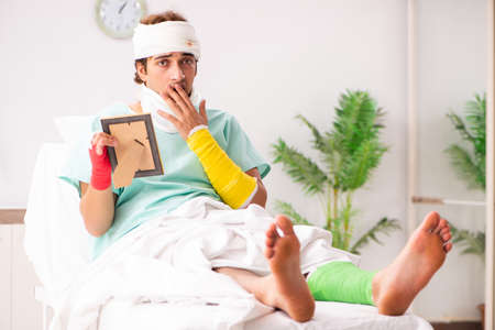 Young injured man staying in the hospital