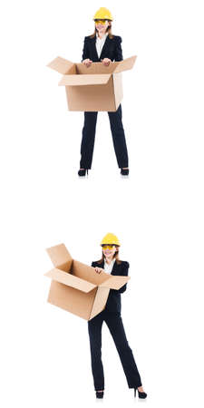 Woman builder with box isolated on whiteの写真素材