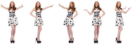 Young woman in polka dot dress isolated on whiteの写真素材