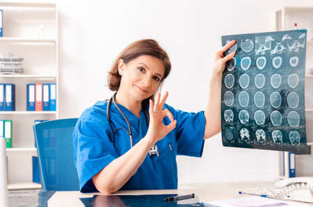 Female doctor radiologist working at the clinicの写真素材