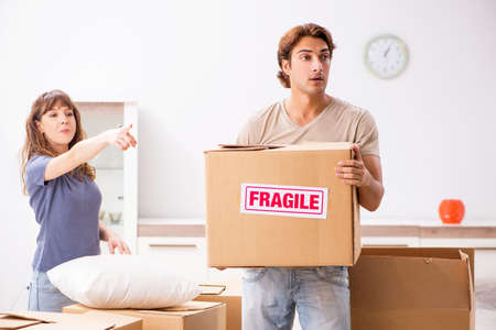 Young pair moving to new appartment