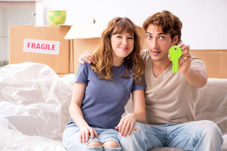 Young pair moving to new appartmentの写真素材