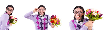 Man holding tulips isolated on whiteの写真素材