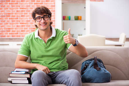 Young student preparing for exams at homeの写真素材
