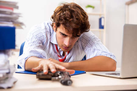 Bankrupt businessman thinking of suicideの写真素材