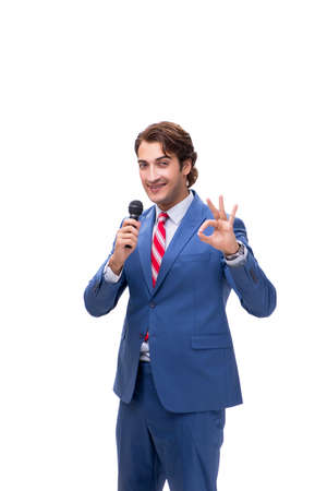 Elegant man with microphone isolated on whiteの写真素材