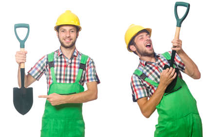 Industrial worker with shovel isolated on whiteの写真素材