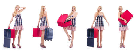 Beautiful woman with suitcase isolated on whiteの写真素材