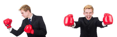 Young employee with boxing gloves isolated on white