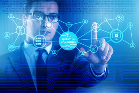 Businessman pressing virtual button in quantum computing concept