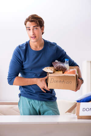Concept of charity with donated clothingの写真素材