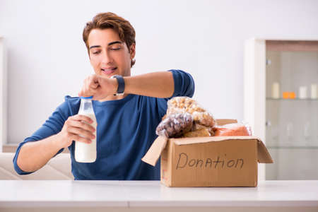 Concept of charity with donated clothingの写真素材