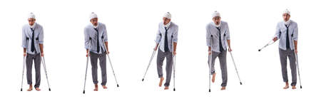 Injured businessman isolated on whiteの写真素材