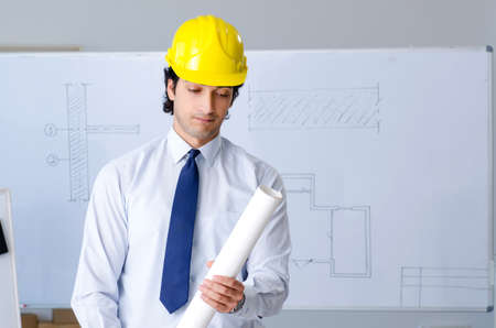 Young handsome architect working on the projectの写真素材